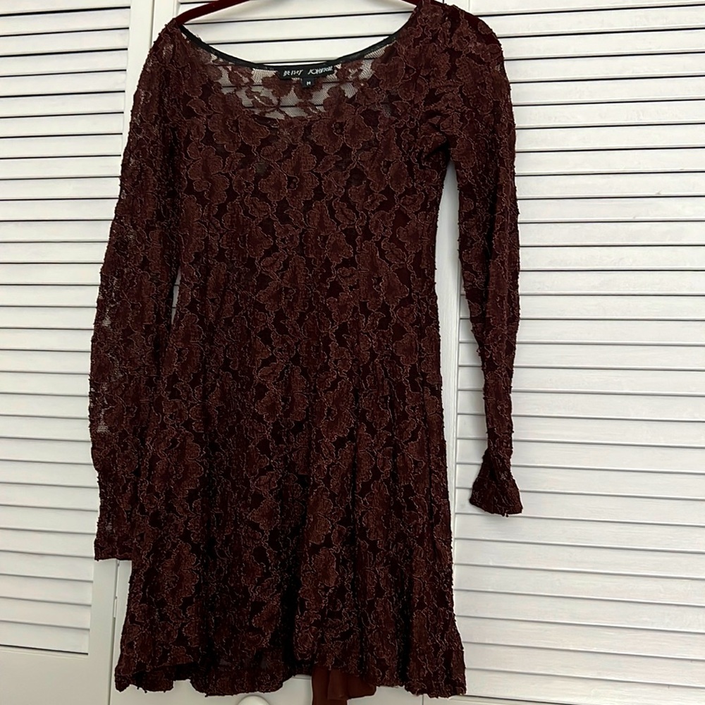 A typical Betsey Johnson style dress or top. Long sleeve lace Dress with lining